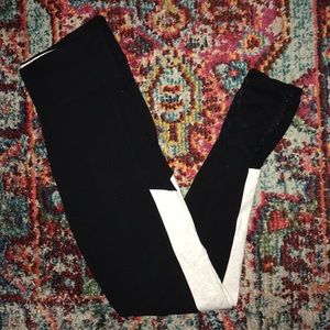 PINK Yoga leggings with crisscross design at ankle